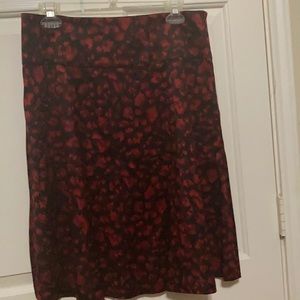 Red abs black skirt